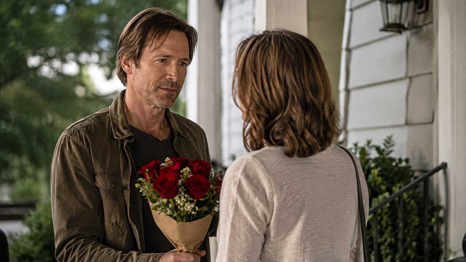 The Best Of Me ending represented by a bittersweet romantic garden scene