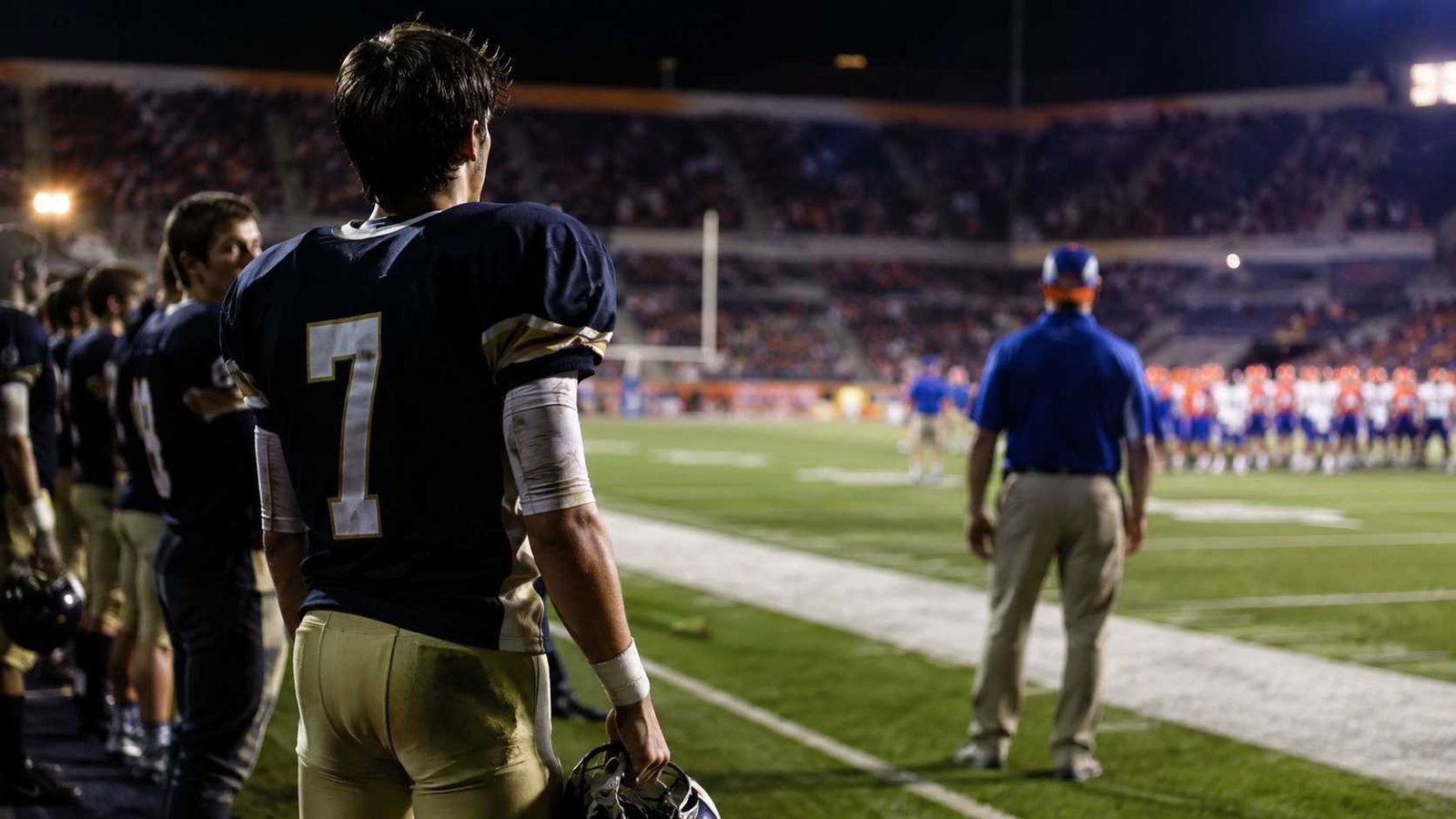 Truett Florida Gators true story scene showing a high-school quarterback hoping for a college football scholarship.