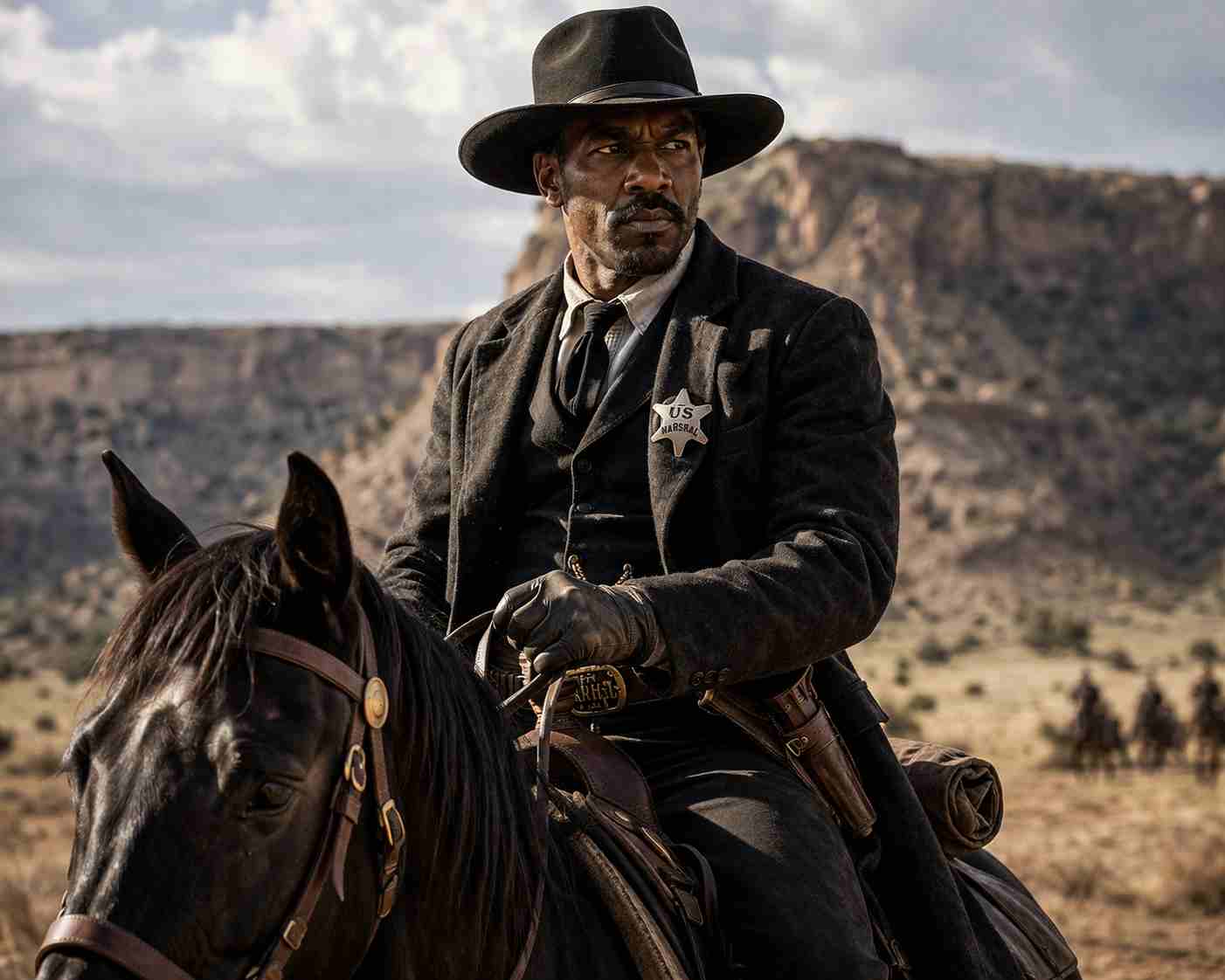 Bass Reeves riding horseback in the Lawmen Bass Reeves true story setting